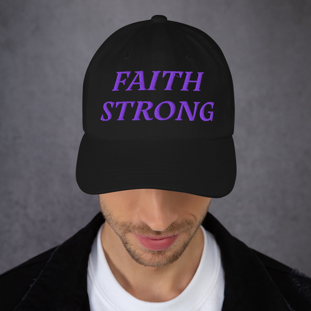 Model is wearing a Faith Strong embroidered hat – bold purple text, black adjustable unisex cap by ReBirth Living