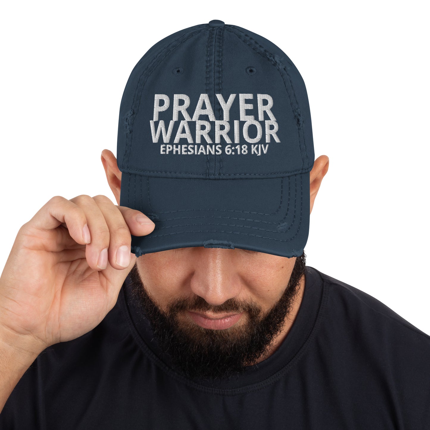 A person is wearing a Prayer Warrior Christian hat – distressed cap with Ephesians 6:18 KJV embroidered Bible verse, navy, adjustable unisex faith-based headwear by ReBirth Living