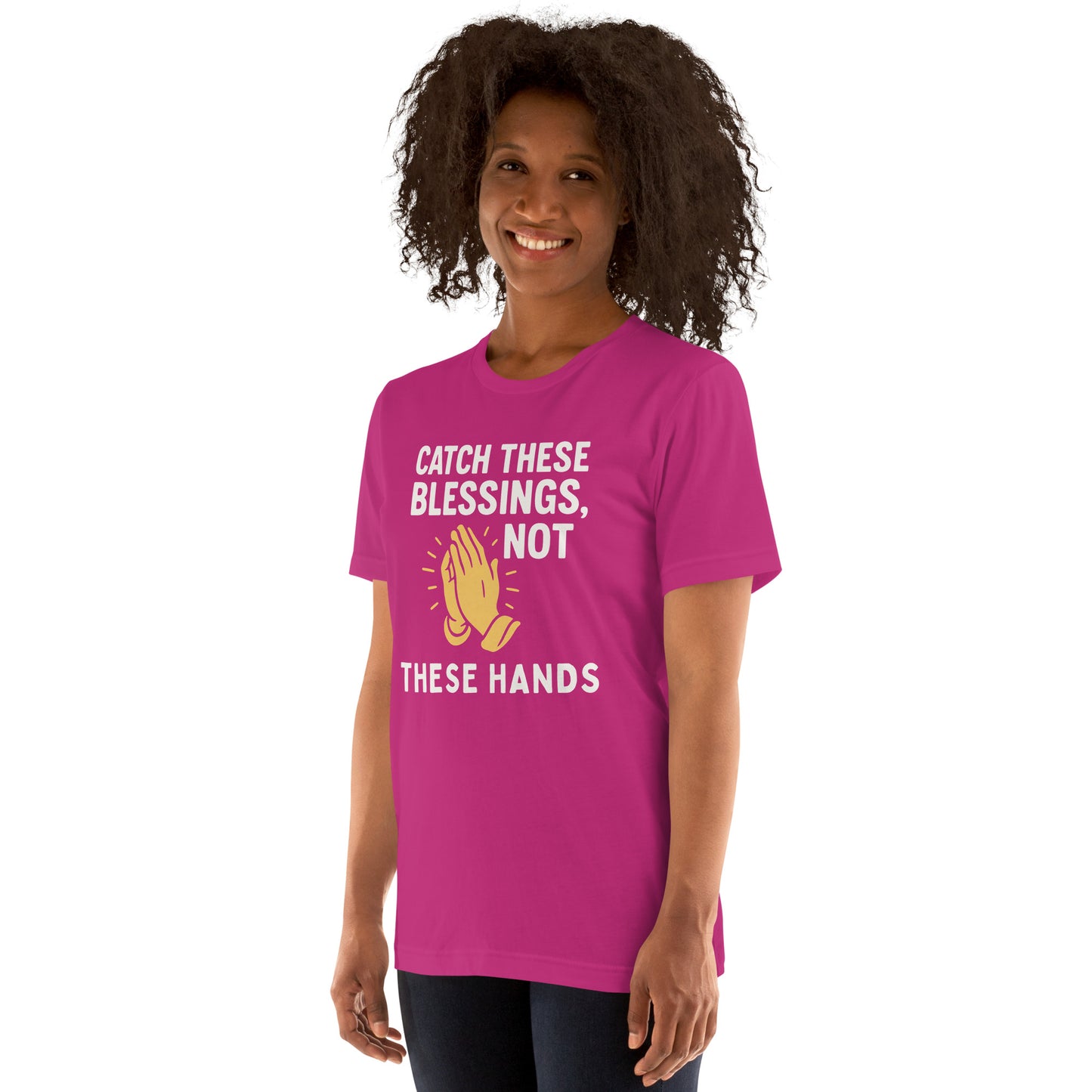 Model showcasing a Catch These Blessings, Not These Hands – funny Christian t-shirt, berry, faith-based humor design with prayer hands by ReBirth Living