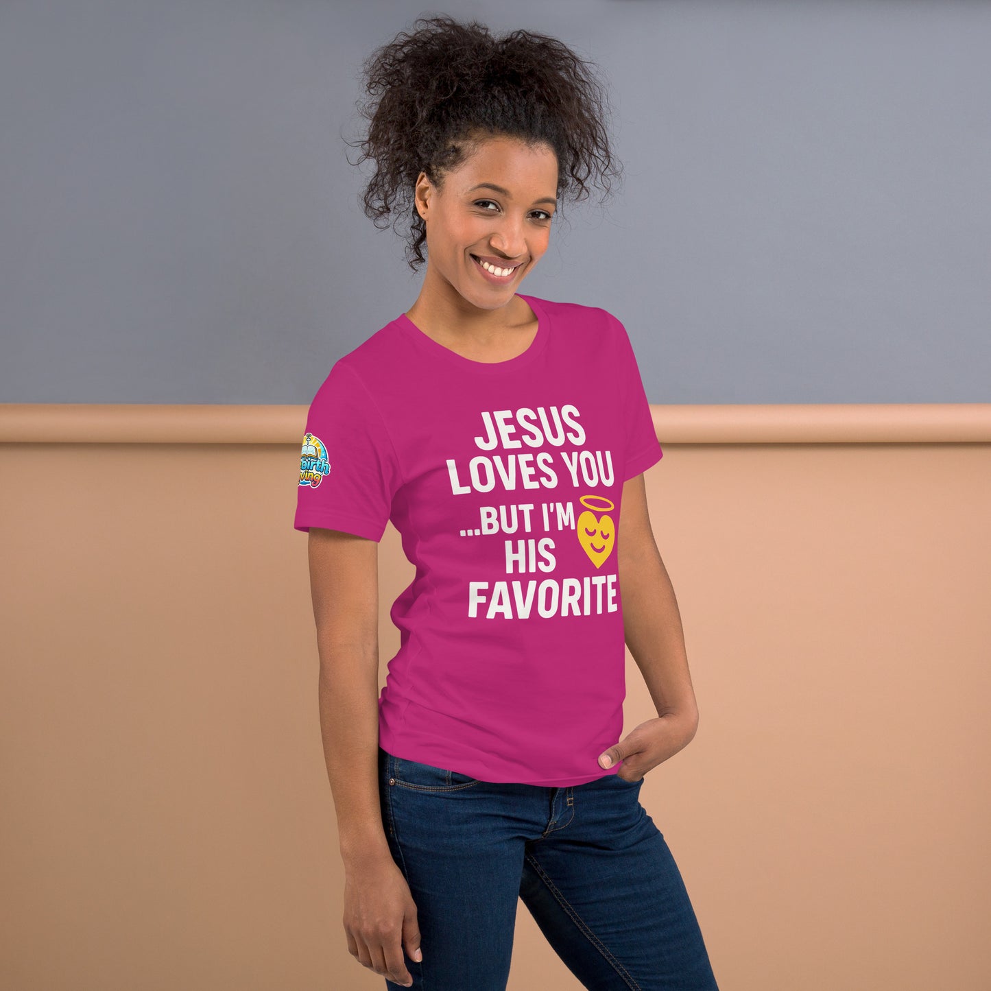 Model wearing “Jesus Loves You… But I’m His Favorite” – funny Christian t-shirt, berry, faith humor design with golden smiling heart and halo by ReBirth Living