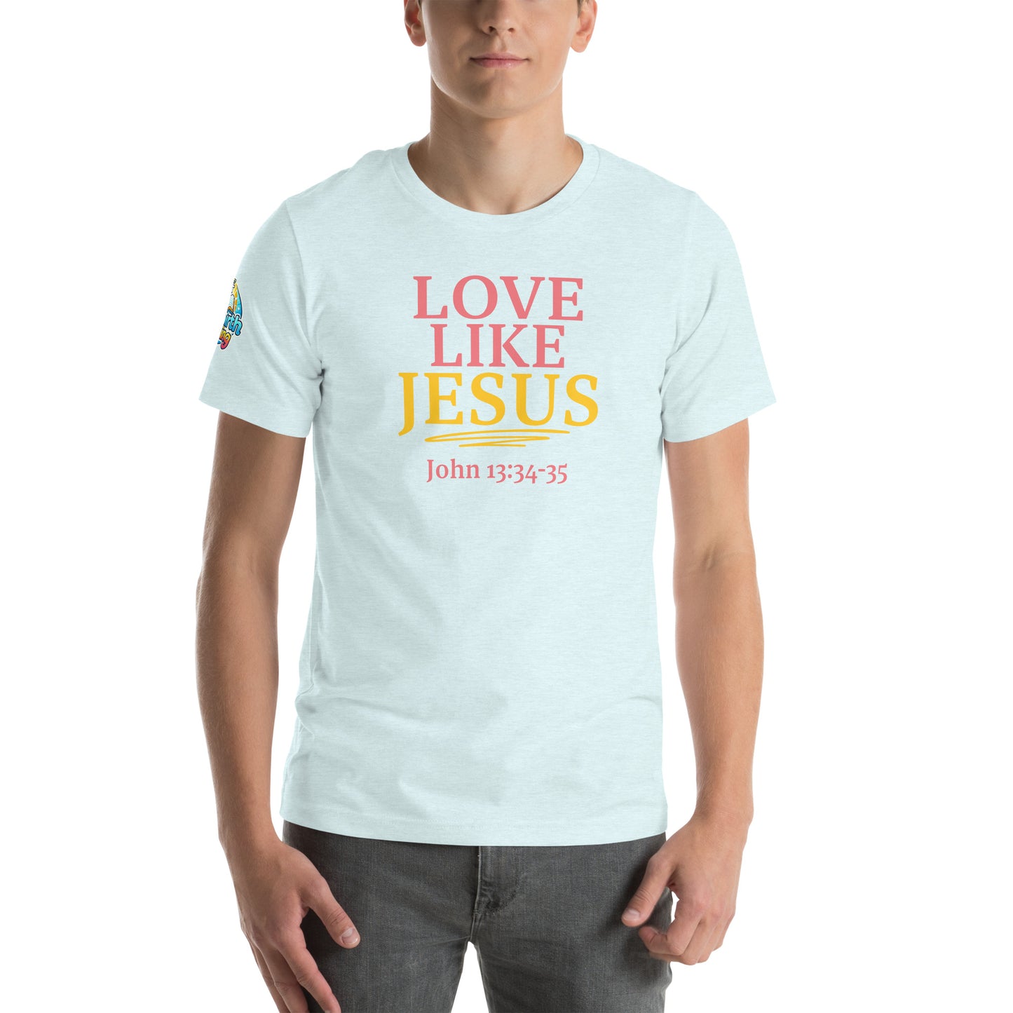 Product mockupA person is wearing a Love Like Jesus Christian t-shirt – bold faith graphic tee for men and women, heather ice blue, unisex design by ReBirth Living