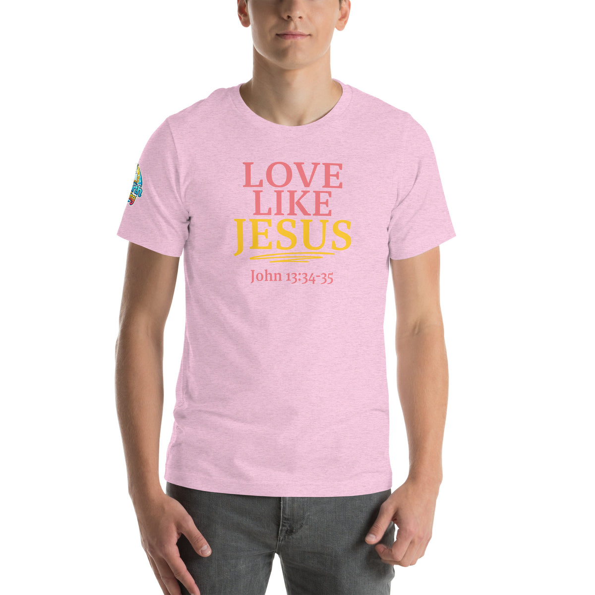 A person is wearing a Love Like Jesus Christian t-shirt – bold faith graphic tee for men and women, heather prism pink, unisex design by ReBirth Living