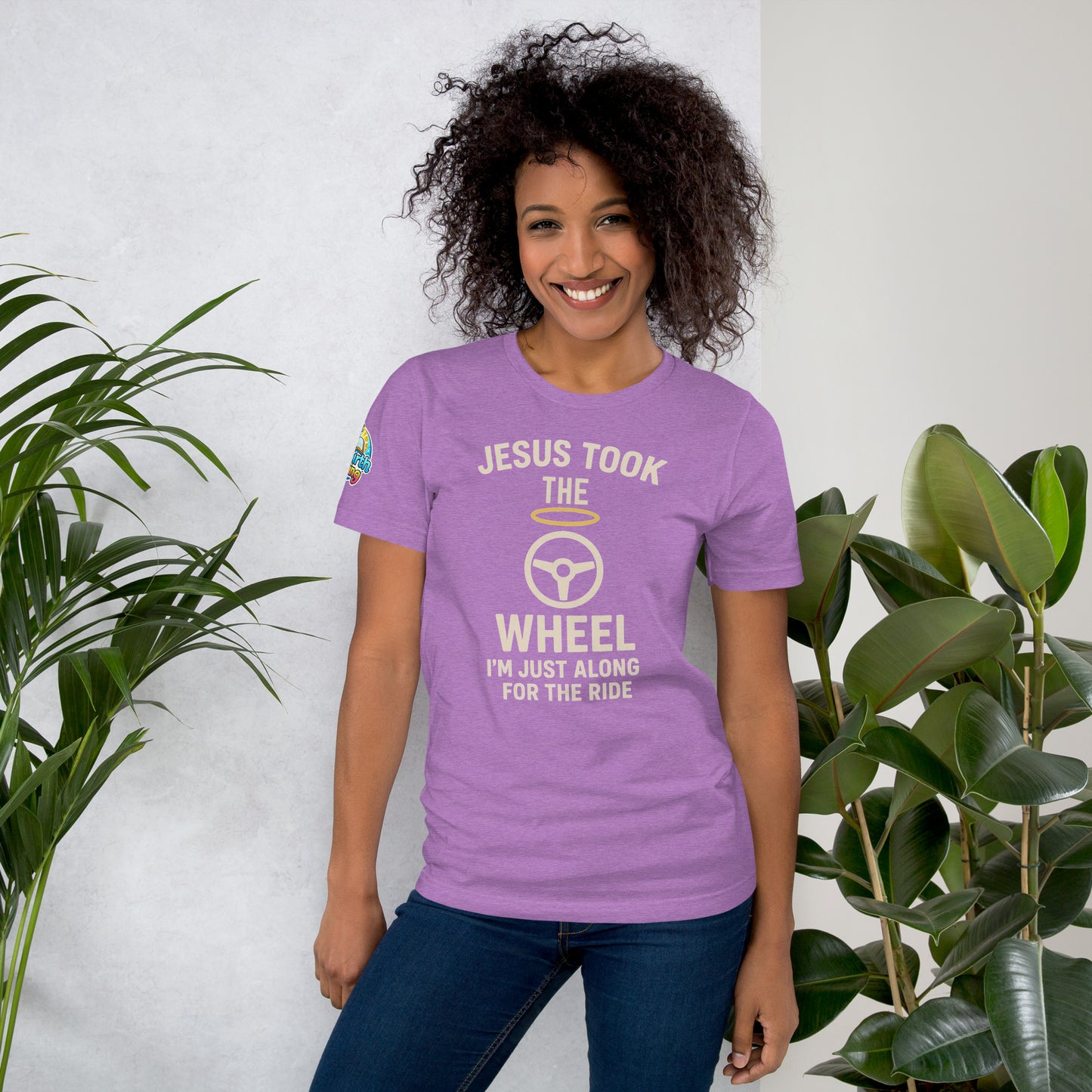 Model showcasing a Jesus Took the Wheel – I’m Just Along for the Ride – funny Christian t-shirt, heather team purple, faith humor design by ReBirth Living