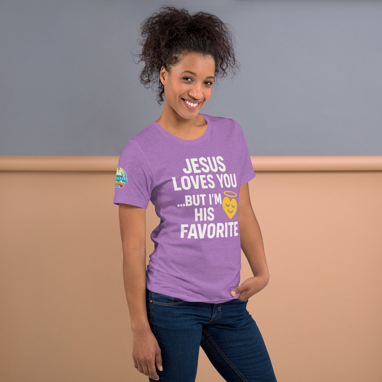 Model wearing “Jesus Loves You… But I’m His Favorite” – funny Christian t-shirt, heather team purple, faith humor design with golden smiling heart and halo by ReBirth Living