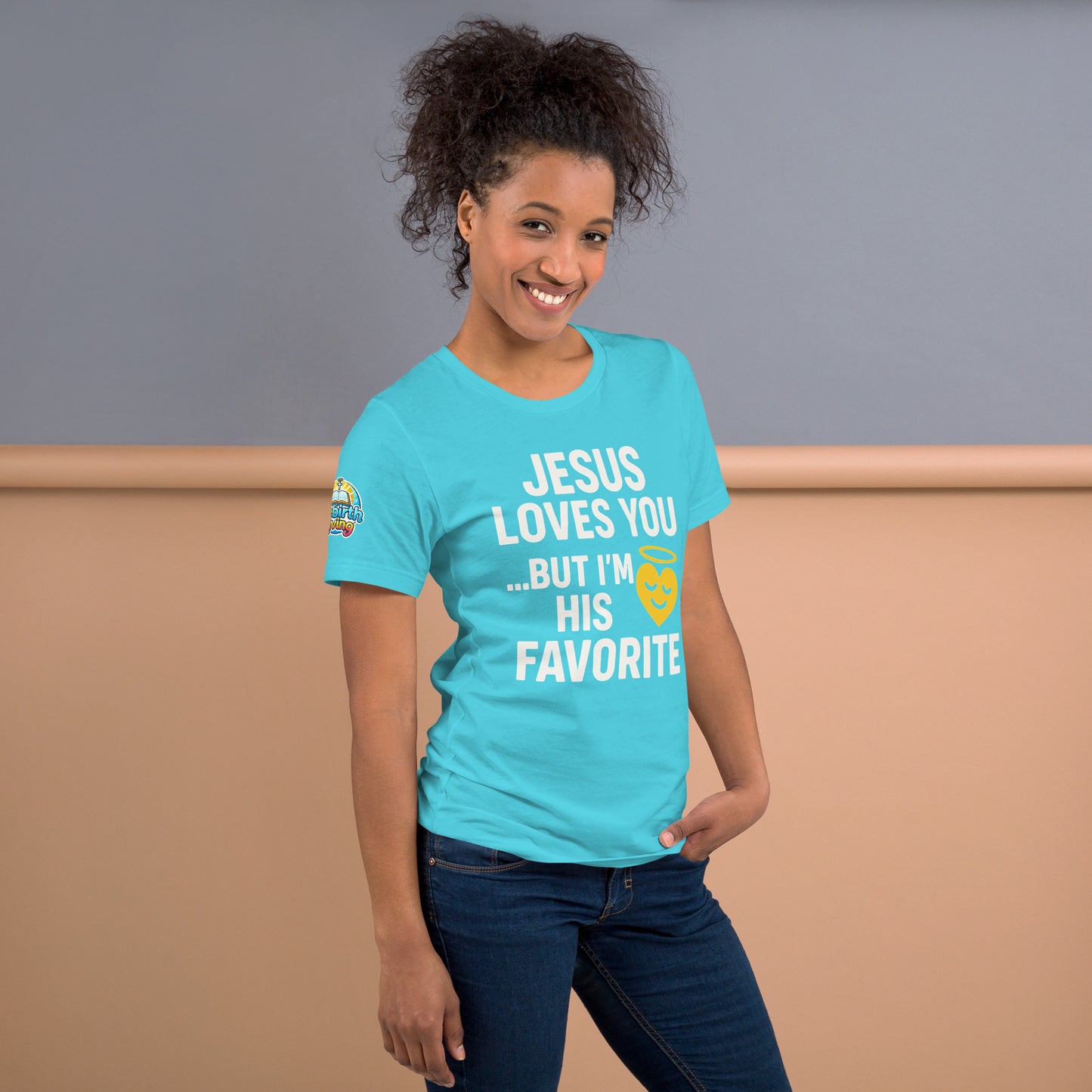 Model wearing “Jesus Loves You… But I’m His Favorite” – funny Christian t-shirt, turquoise, faith humor design with golden smiling heart and halo by ReBirth Living