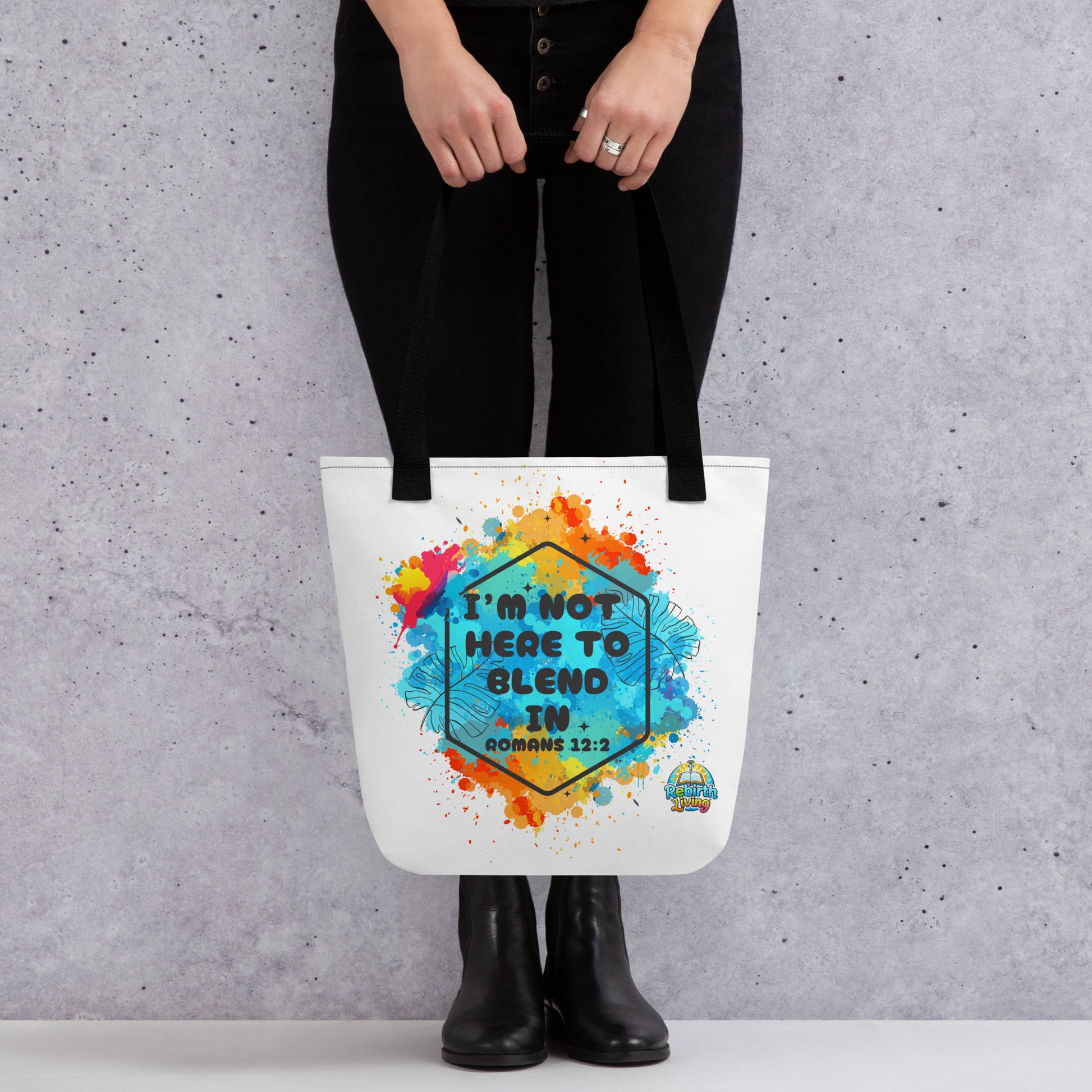 A Person holding a I’m Not Here to Blend In Christian canvas tote bag – reusable faith-based carryall, natural cotton, inspirational statement design by ReBirth Living