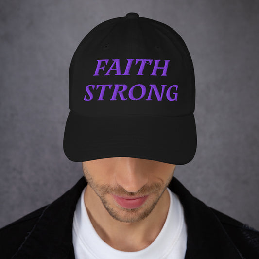 Model is wearing a Faith Strong embroidered hat – bold purple text, black adjustable unisex cap by ReBirth Living
