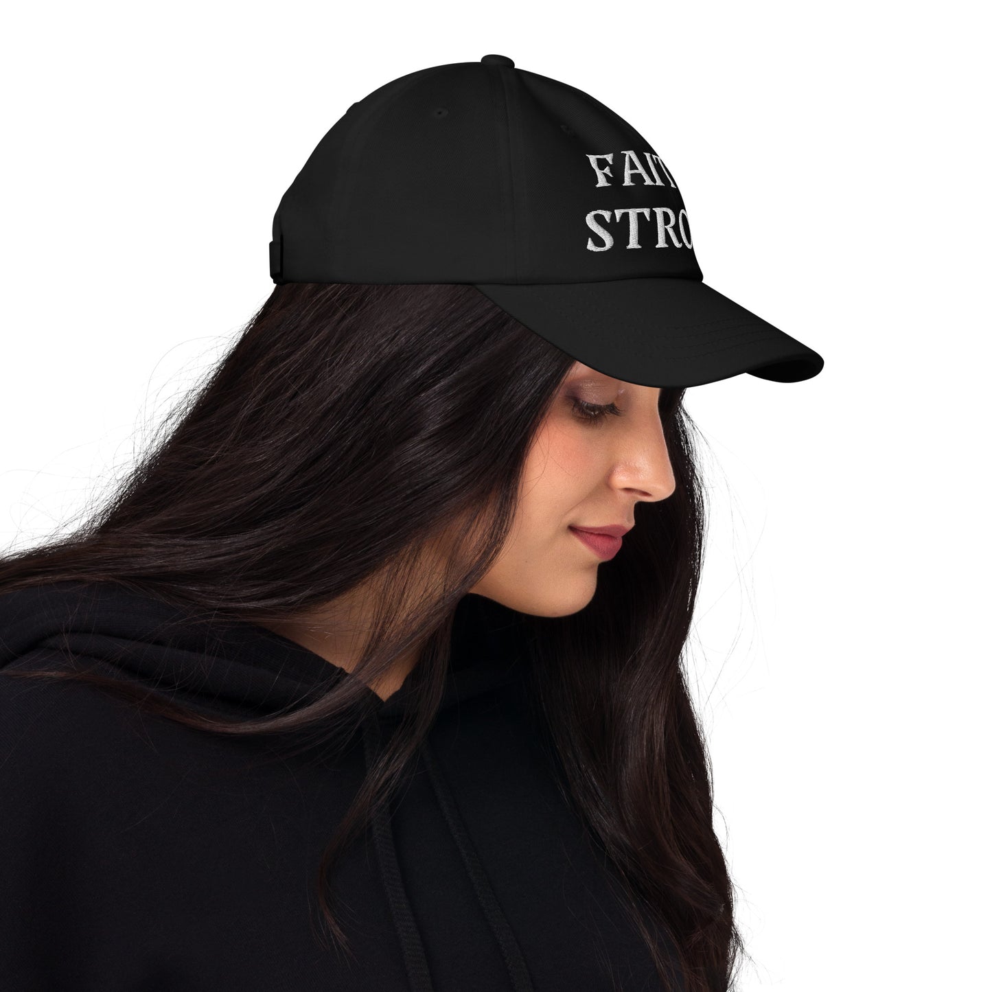 Faith Strong hat – classic white embroidery, adjustable unisex cap available in multiple colors by ReBirth Living. The model has on the black hat with white embroidery.