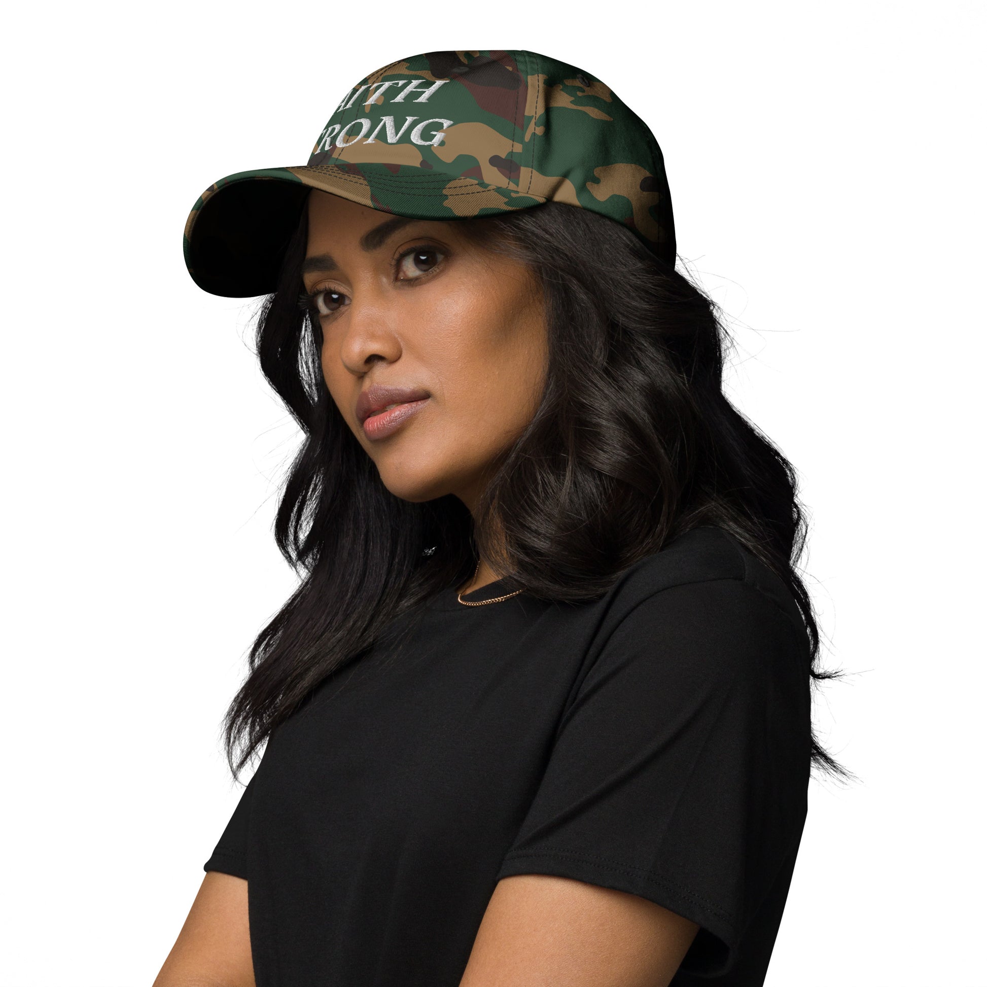 Person is wearing a Faith Strong cap – bold Christian statement hat, camo green, with white embroidery, adjustable unisex design by ReBirth Living