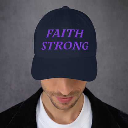 Model is wearing a Faith Strong embroidered hat – bold purple text, navy adjustable unisex cap by ReBirth Living