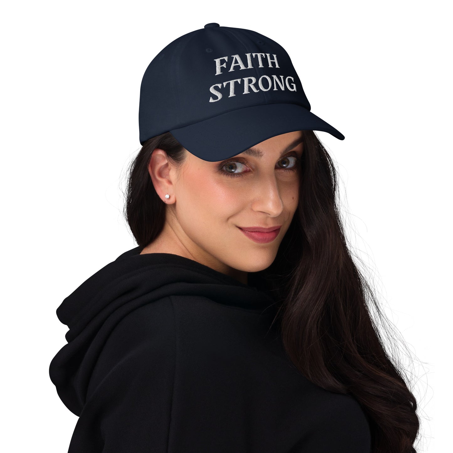 Faith Strong hat – classic white embroidery, adjustable unisex cap available in multiple colors by ReBirth Living. The model has on the navy hat with white embroidery.