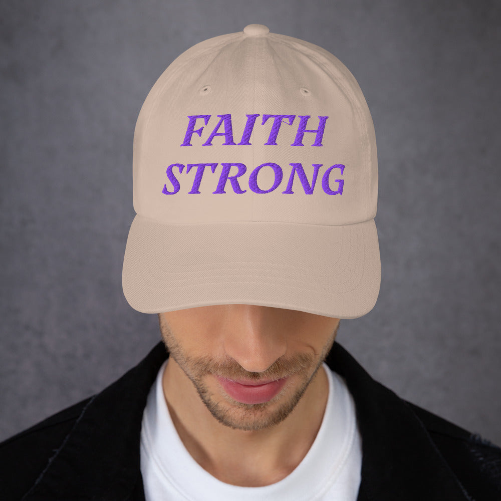 Model is wearing a Faith Strong embroidered hat – bold purple text, stone adjustable unisex cap by ReBirth Living