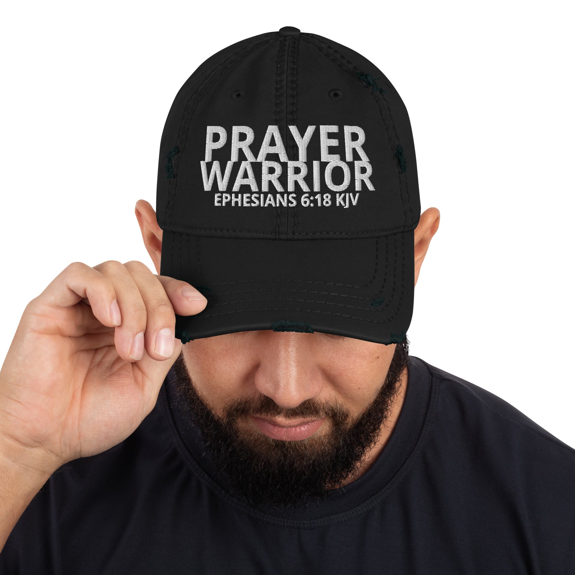 A person is wearing a Prayer Warrior Christian hat – distressed cap with Ephesians 6:18 KJV embroidered Bible verse, black, adjustable unisex faith-based headwear by ReBirth Living