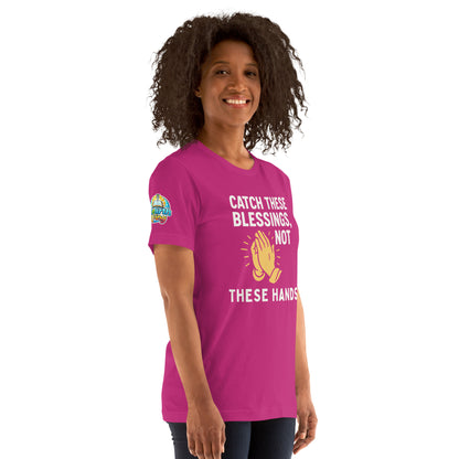 Model showcasing a Catch These Blessings, Not These Hands – funny Christian t-shirt, berry, faith-based humor design with prayer hands by ReBirth Living