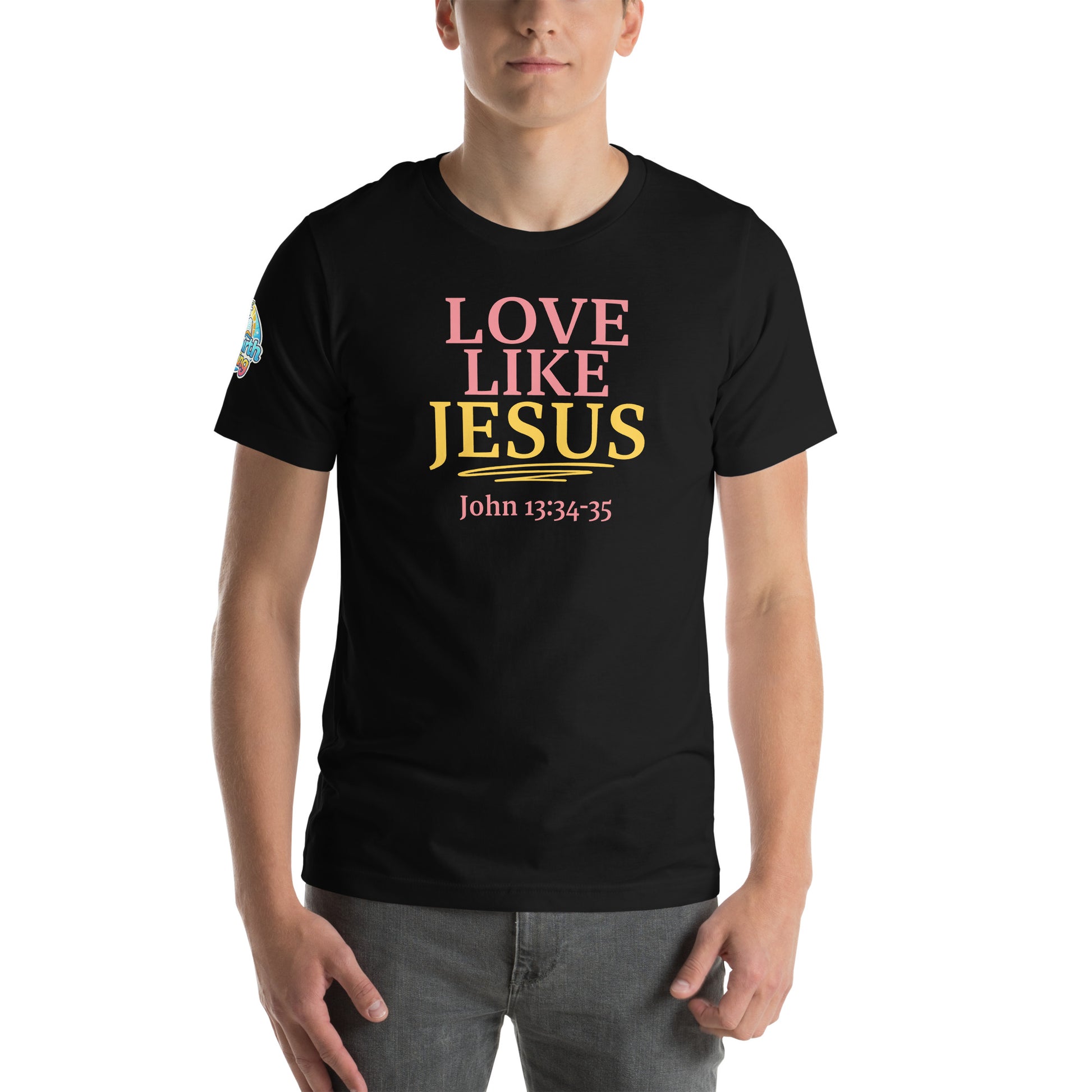A person is wearing a Love Like Jesus Christian t-shirt – bold faith graphic tee for men and women, black, unisex design by ReBirth Living