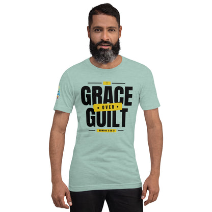 A Person is wearing a Grace Over Guilt Christian unisex t-shirt – Romans 5:20–21 KJV scripture design, heather prism dusty blue, faith-based apparel by ReBirth Living