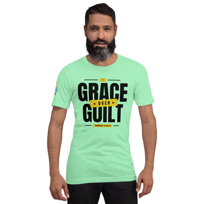 A Person is wearing a Grace Over Guilt Christian unisex t-shirt – Romans 5:20–21 KJV scripture design, mint, faith-based apparel by ReBirth Living