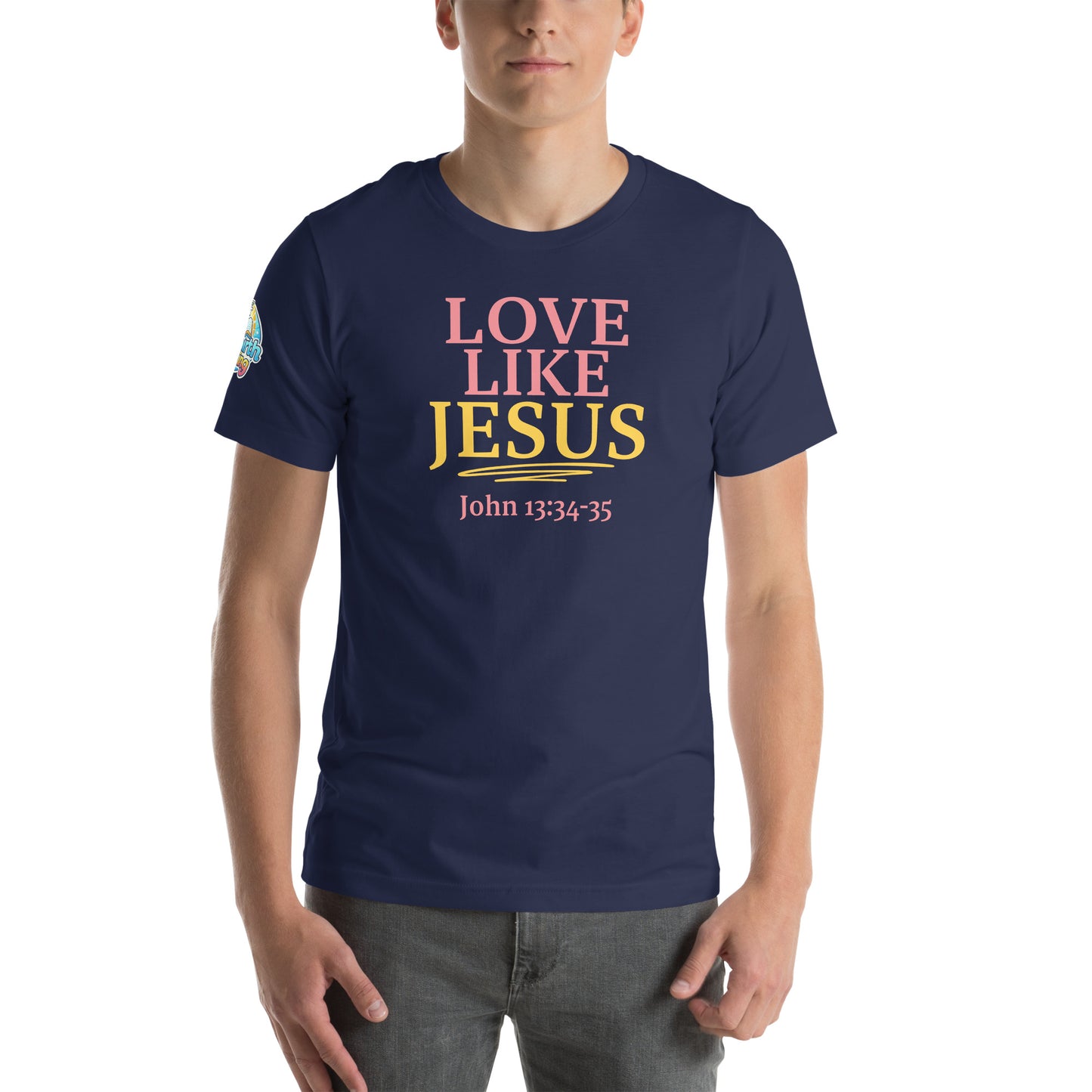 A person is wearing a Love Like Jesus Christian t-shirt – bold faith graphic tee for men and women, navy, unisex design by ReBirth Living