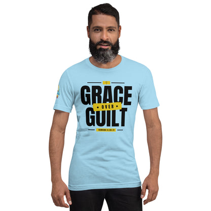 A Person is wearing a Grace Over Guilt Christian unisex t-shirt – Romans 5:20–21 KJV scripture design, ocean blue, faith-based apparel by ReBirth Living