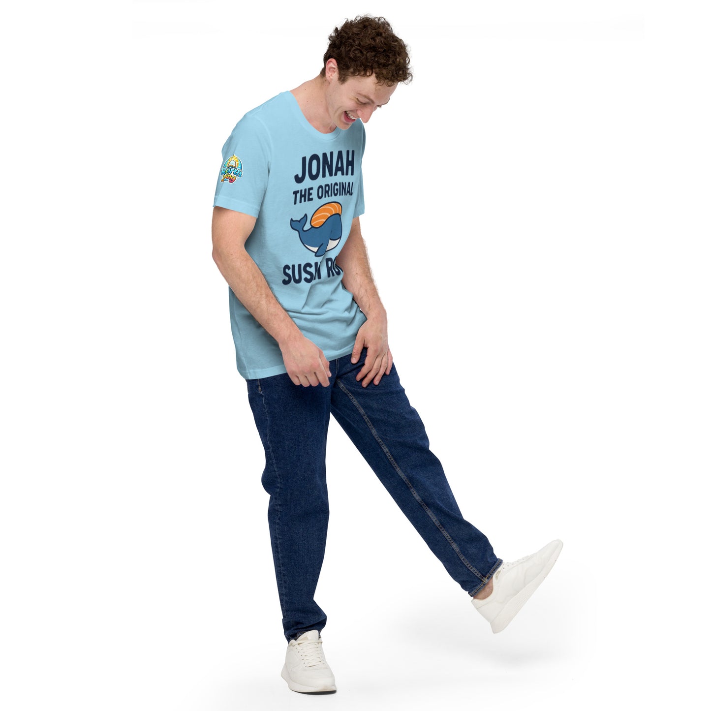 Model wearing “Jonah the Original Sushi Roll” – funny Christian unisex t-shirt, ocean blue, Bible humor design with blue whale carrying sushi by ReBirth Living