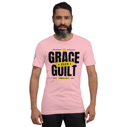 A Person is wearing a Grace Over Guilt Christian unisex t-shirt – Romans 5:20–21 KJV scripture design, pink, faith-based apparel by ReBirth Living