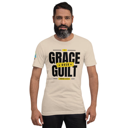 A Person is wearing a Grace Over Guilt Christian unisex t-shirt – Romans 5:20–21 KJV scripture design, cream, faith-based apparel by ReBirth Living