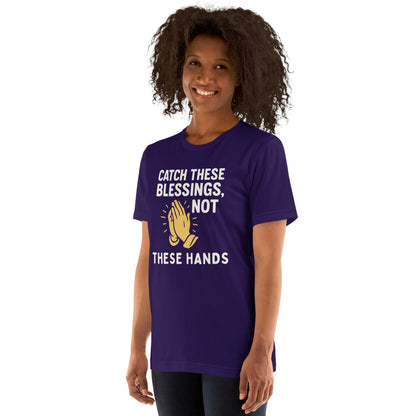 Model showcasing a Catch These Blessings, Not These Hands – funny Christian t-shirt, team purple, faith-based humor design by ReBirth Living