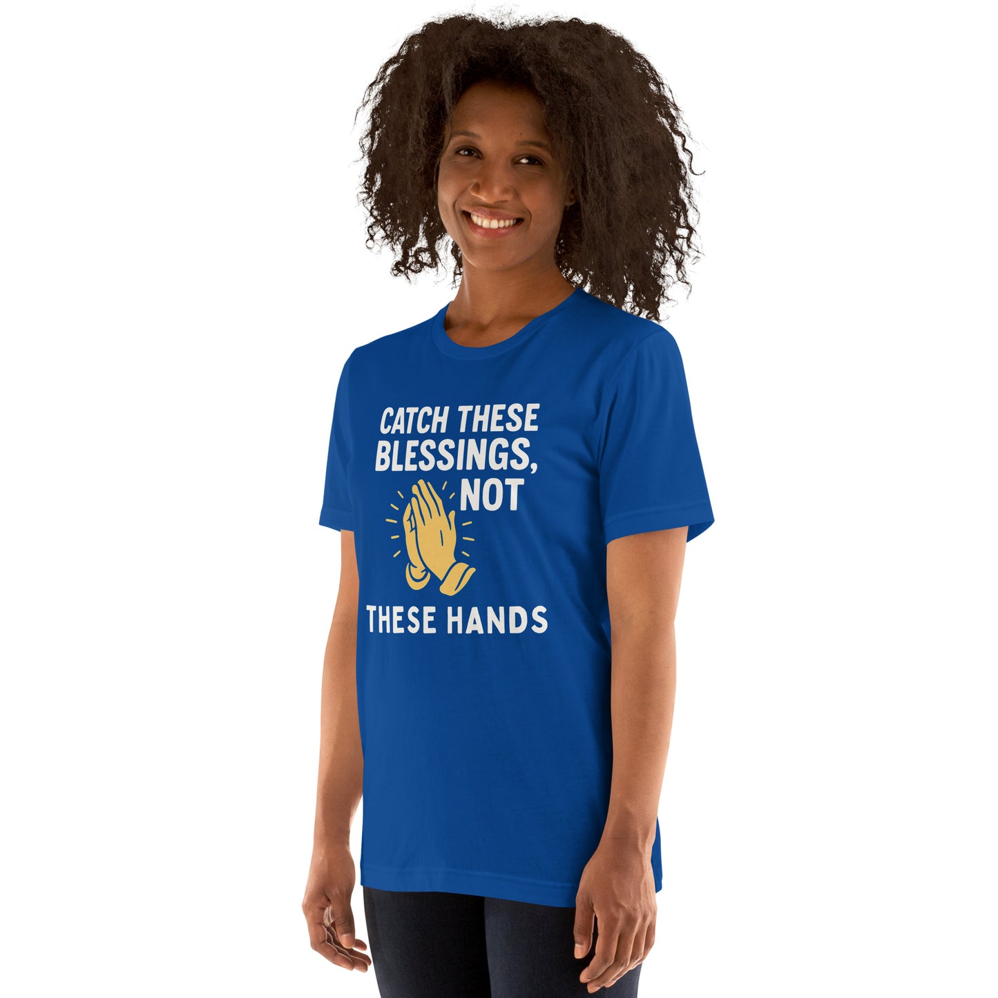 Model showcasing a Catch These Blessings, Not These Hands – funny Christian t-shirt, true royal, faith-based humor design with prayer hands by ReBirth Living