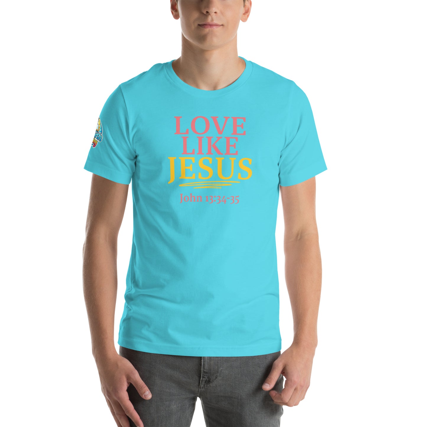 A person is wearing a Love Like Jesus Christian t-shirt – bold faith graphic tee for men and women, turquoise blue, unisex design by ReBirth Living