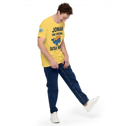 Model wearing “Jonah the Original Sushi Roll” – funny Christian unisex t-shirt, yellow, Bible humor design with blue whale carrying sushi by ReBirth Living